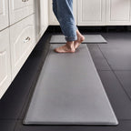 Grey anti fatigue kitchen mat with a waterproof PVC surface