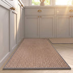 Grey faux sisal kitchen runner with a bound edge