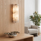 Natural alabaster sconce mounted on an oak panelled wall