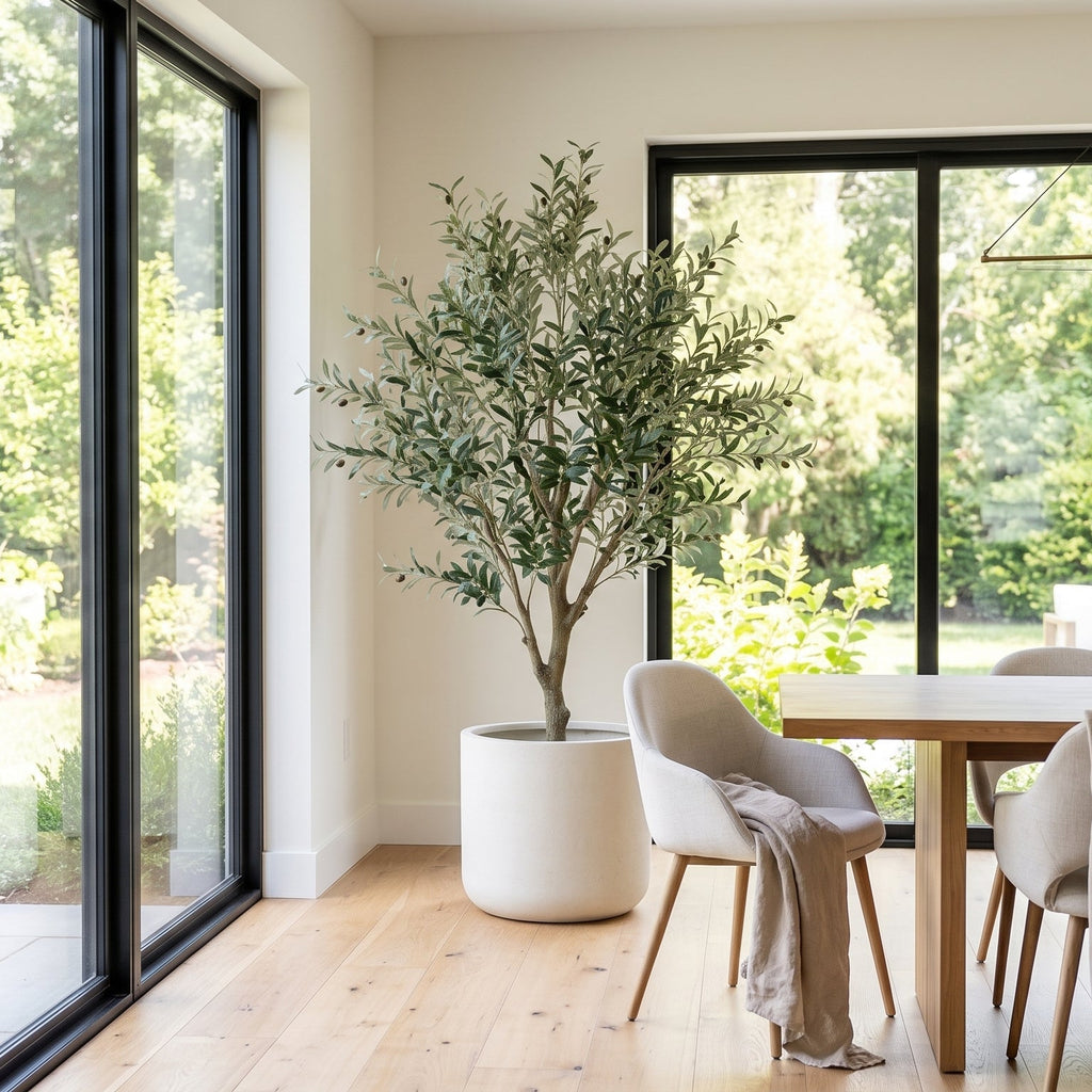 Modern dining room with a table, chairs, and a large window view.