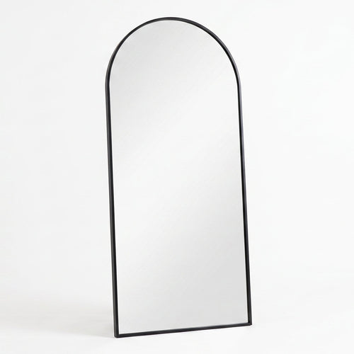 Arched mirror with black frame on a white background