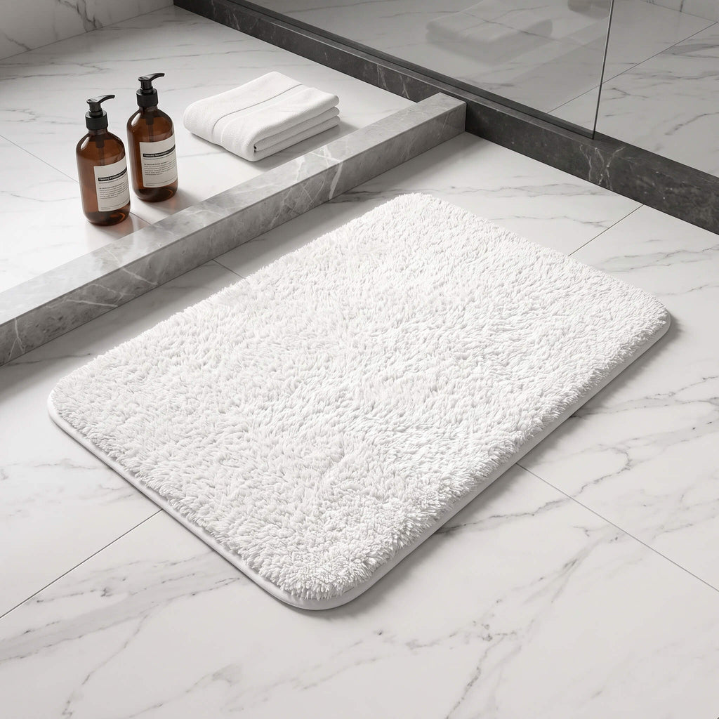 White plush bath rug showing its rectangular shape
