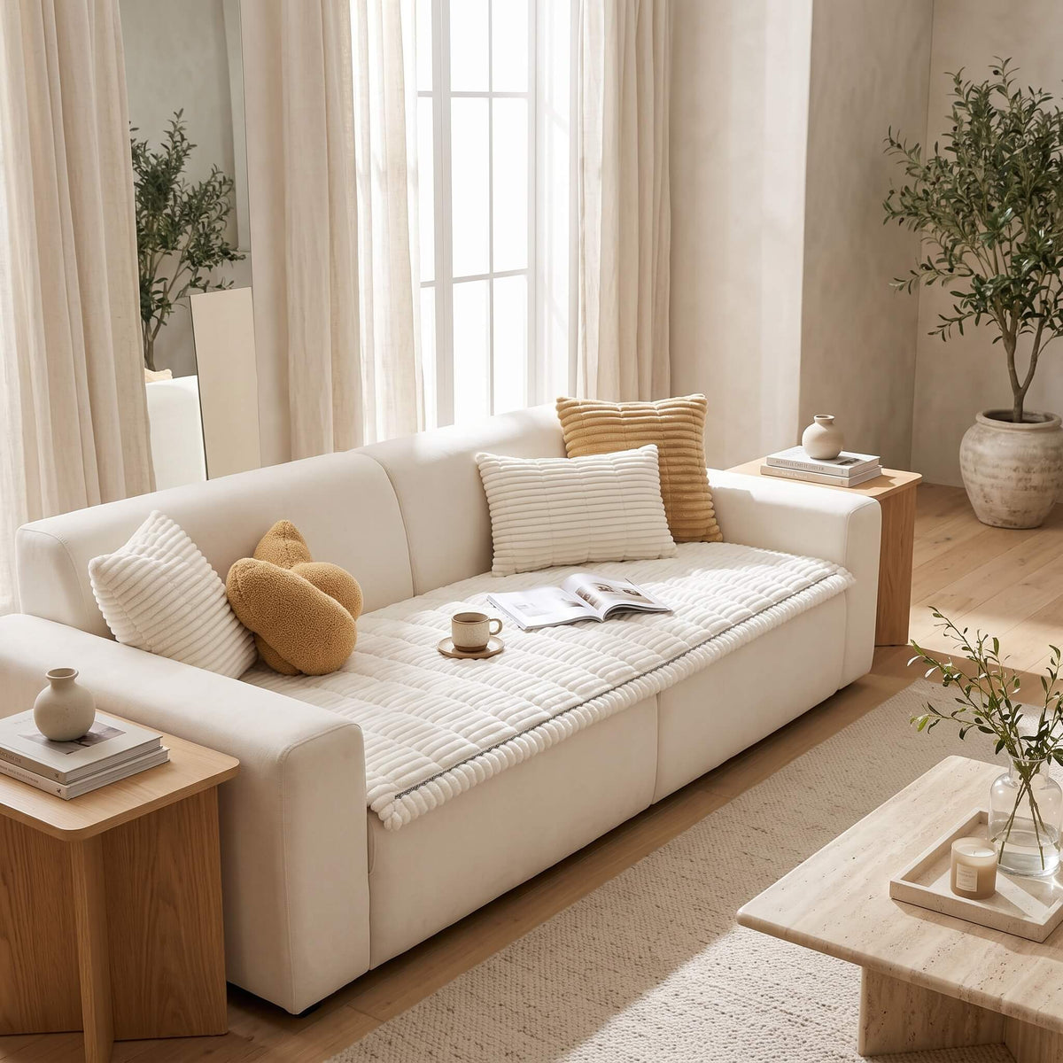 White plush pleated sofa cover with cushions