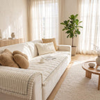 White textured sofa cover on a sofa in a sunlit living room