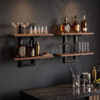 Two tier wall shelf holding glassware in a kitchen