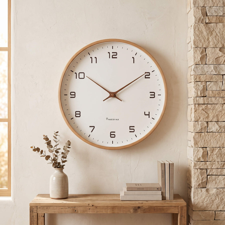 Clean white dial and slim markers on the wooden wall clock