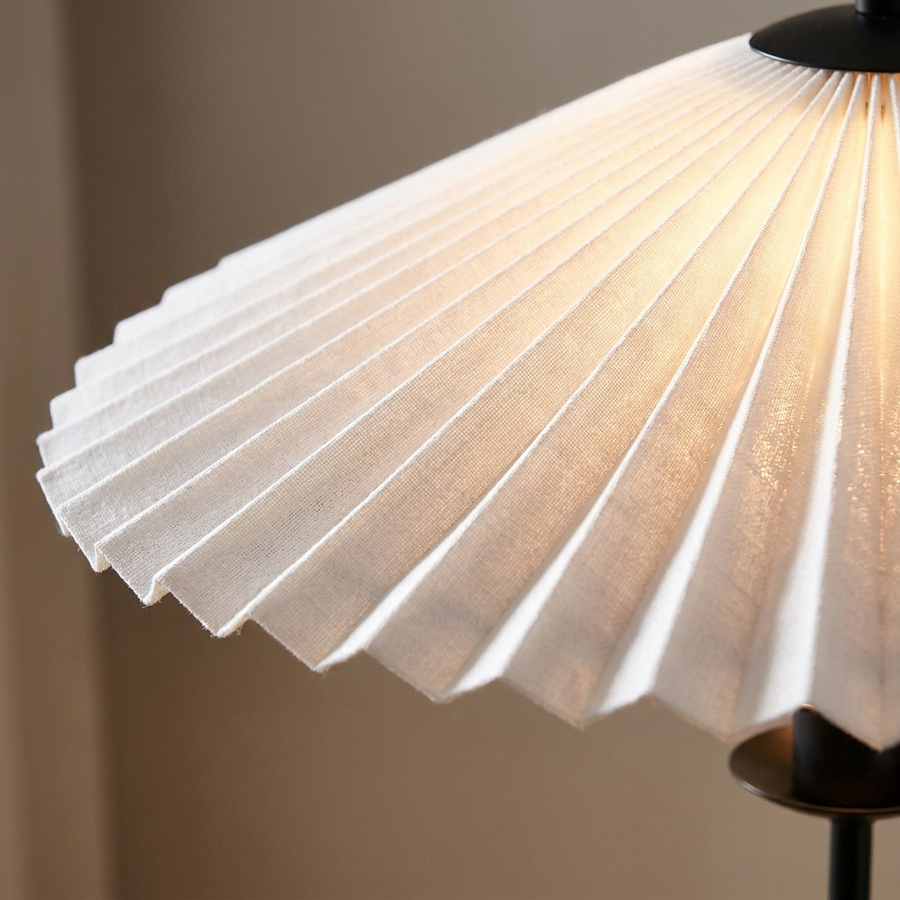 Close-up of the pleated white fluted shade on the Meander Wavy Floor Lamp