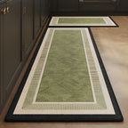 Olive Step absorbent kitchen mat, olive green centre with a stepped cream border, on a timber floor