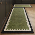 Olive Frame absorbent kitchen mat, olive green centre with a fine cream frame, on a timber floor