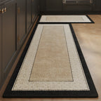 Sand Frame absorbent kitchen mat, sand centre with an ivory and black frame, on a timber floor