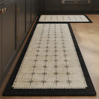 Ivory Grid absorbent kitchen mat, ivory grid pattern with a black edge, on a timber floor
