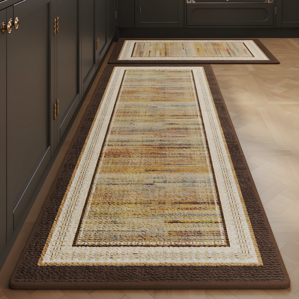 Amber Stripe absorbent kitchen mat, amber and rust stripes with a brown edge, on a timber floor