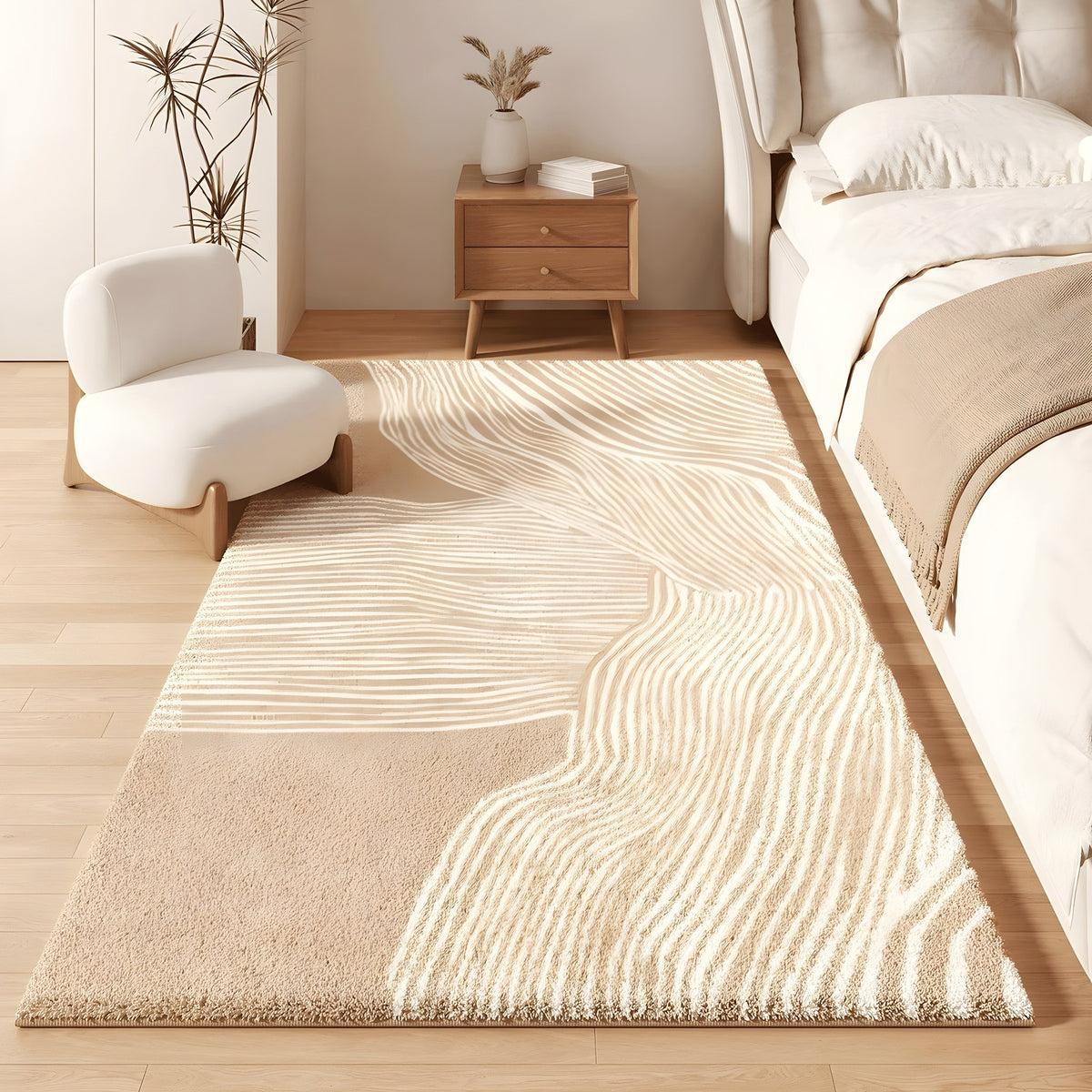 Dune faux cashmere bedroom rug, cream with soft sand-wave lines, beside a bed