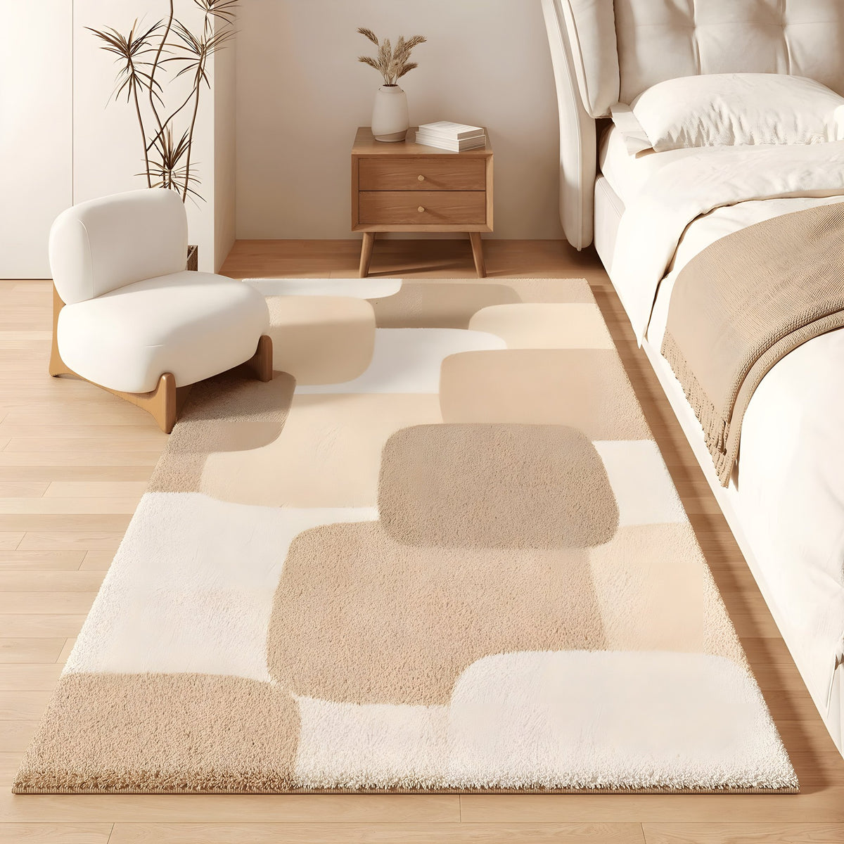 Mosaic faux cashmere bedroom rug, soft-edged blocks in caramel and cream, beside a bed