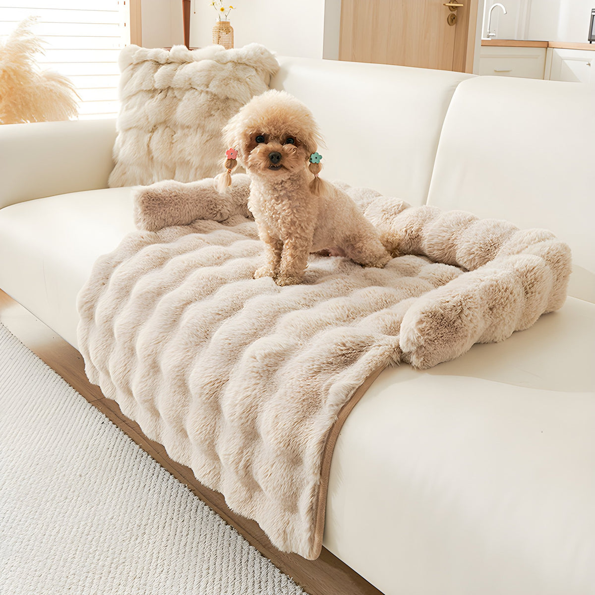Mocha plush faux fur pet sofa mat on a cream sofa with a small dog sitting on it